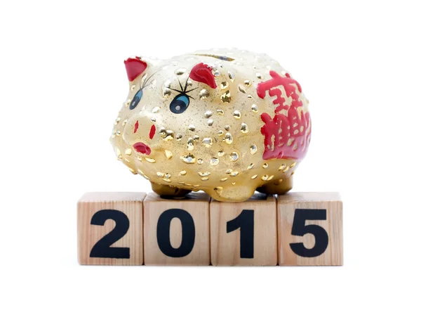 Anno nuovo 2015: salvadanaio e mattoni — Foto Stock