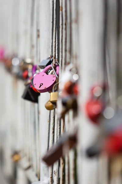 Railings with hanging locks — Stock Photo, Image