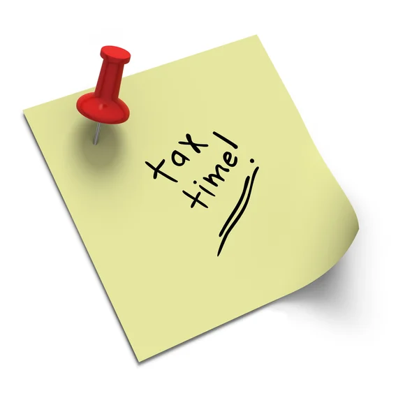 Tax time reminder with pushpin on post it note — Stock Photo, Image