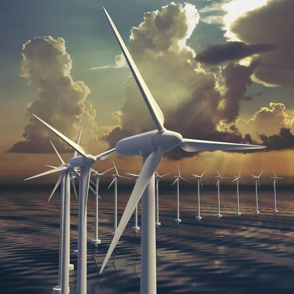 Line of wind generators at sea Royalty Free Stock Images