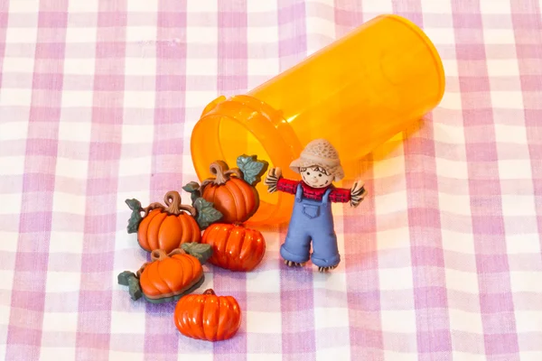 Halloween pills and scarecrow — Stock Photo, Image