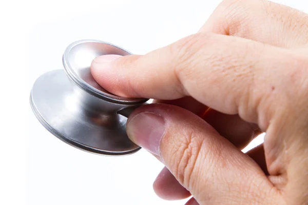 Stethoscope and hand — Stock Photo, Image