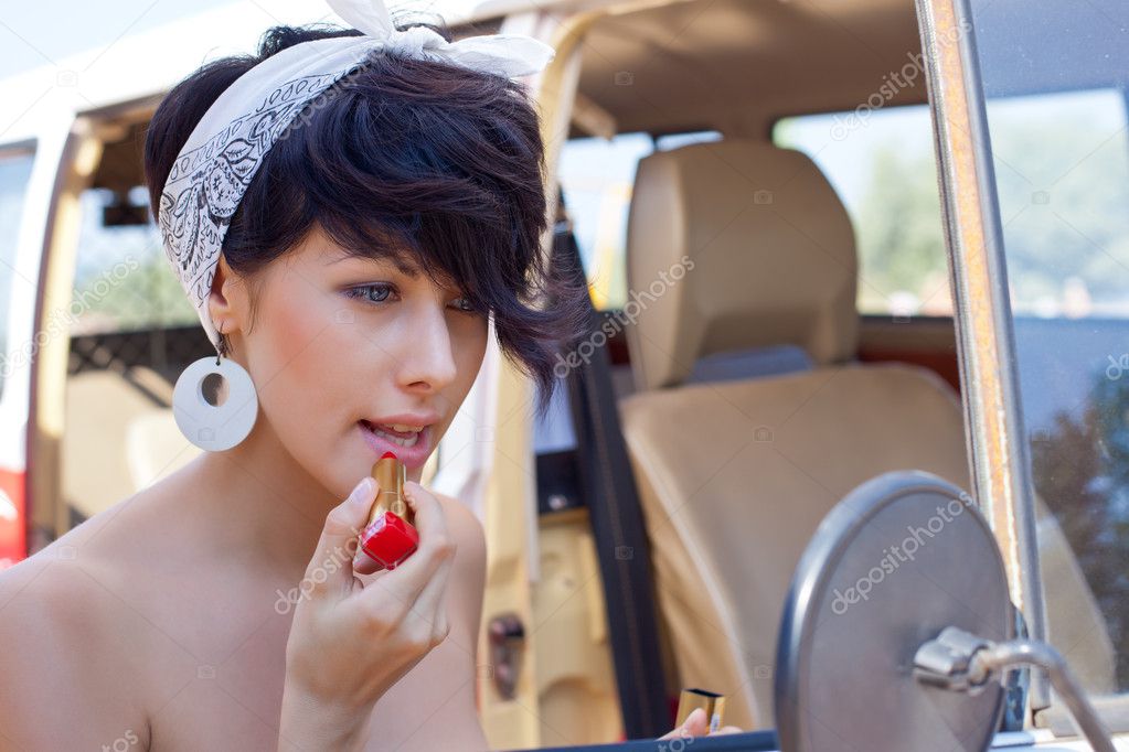 A Beautiful Young Girl With Short Hair Cut And Blue Eyes Stock