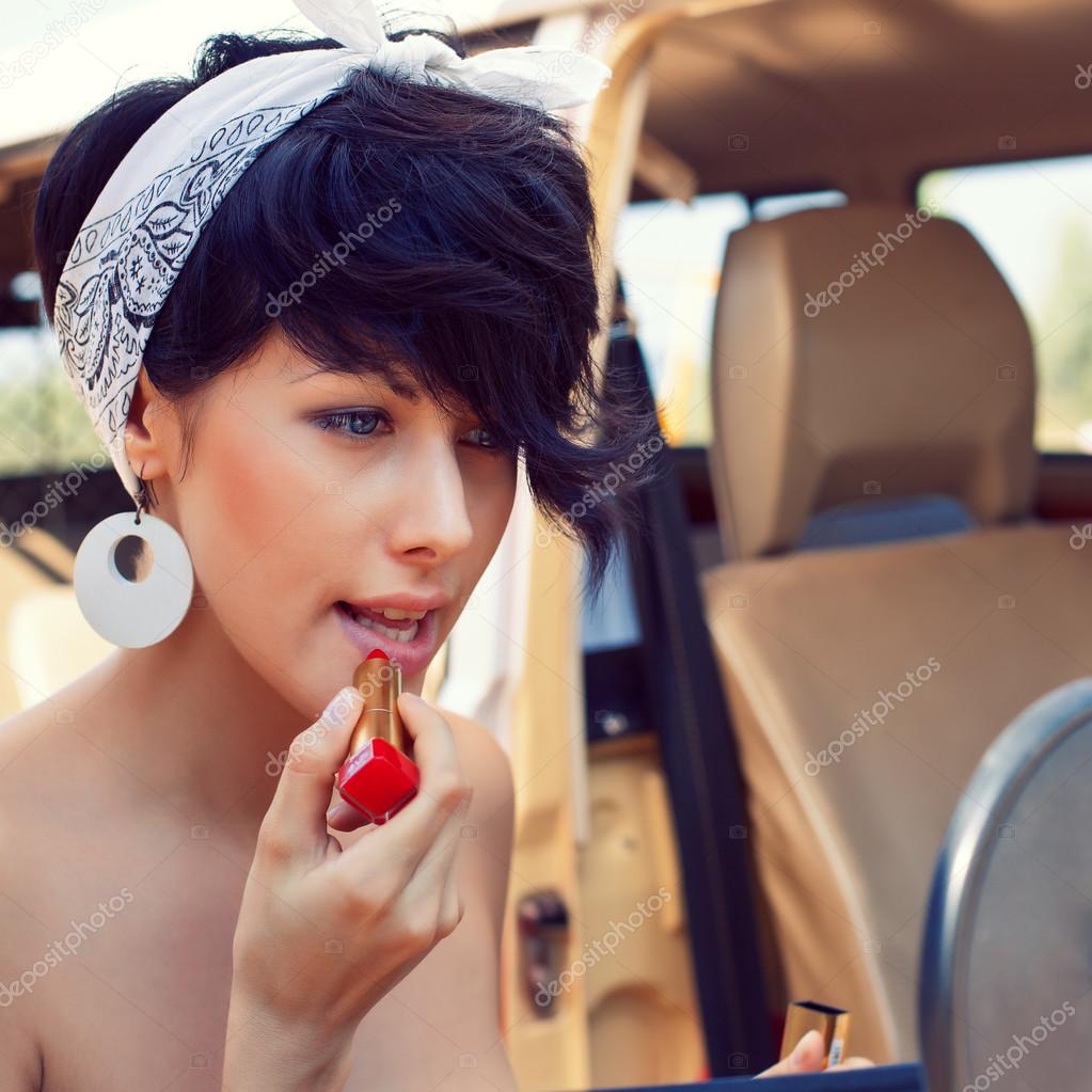 A Beautiful Young Girl With Short Hair Cut And Blue Eyes Stock