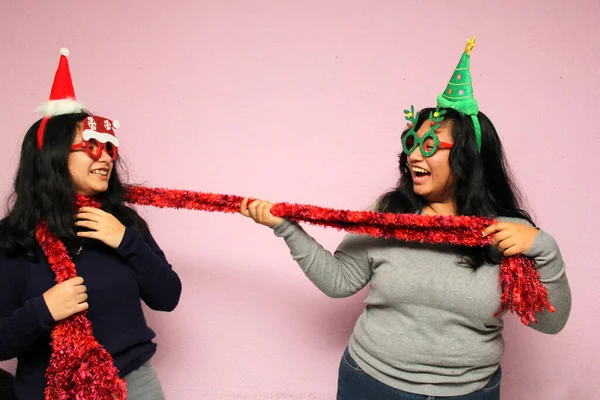 Latin Sisters Friends Christmas Hats Glasses Play Each Other While — Stock Photo, Image