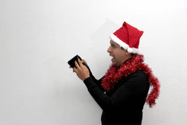 Latino Adult Man Hat Christmas Garland Shows His Wallet Very — Stockfoto