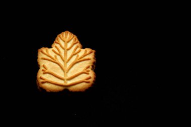 Kanada 'nın geleneksel tatlısı olan Kanada ağaçlarından yapılan ballı ya da akçaağaç şurubuyla doldurulmuş vanilyalı kurabiyeler.