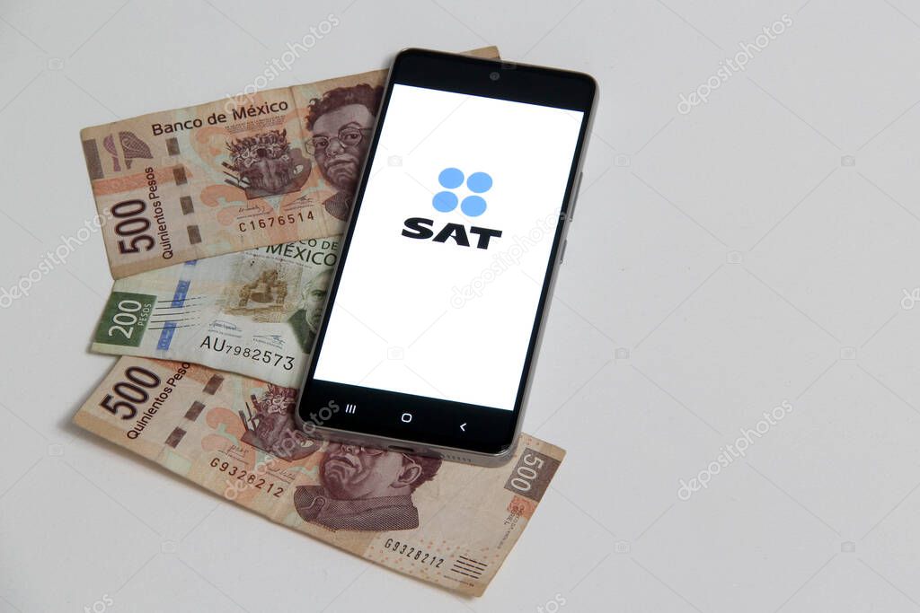 Mexico City, Mexico - April 5, 2022: The app of the Tax Administration Service (SAT) reported that it collected large Mexican taxpayers in the first three months of the year