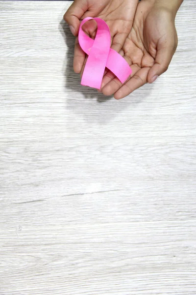 Female Hands Pink Ribbon Vintage Gray Wooden Background Campaign Breast — Fotografie, imagine de stoc