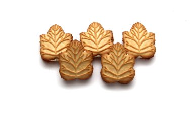 Kanada 'nın geleneksel tatlı ve beyaz arka planında bulunan ballı ya da akçaağaç şurubuyla doldurulmuş vanilyalı kurabiyeler.