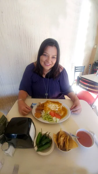 Latin Adult Woman Eats Traditional Mexican Dish Enchiladas Which Fried — Stock Fotó