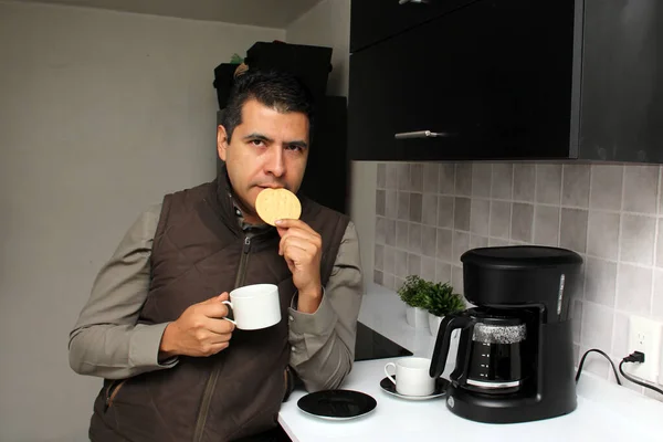 Latino Adult Man Prepares Coffee Coffee Maker Has Cup Accompanied — Stockfoto