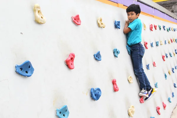 Latin Dark Haired Male Child Blue Shirt Practicing Sports Wall — Stock fotografie