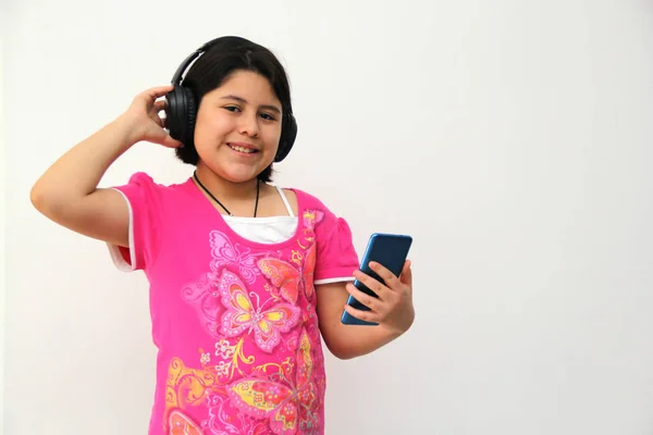 Year Old Hispanic Girl Listens Music Her Headphones Connected Her — Stock Fotó