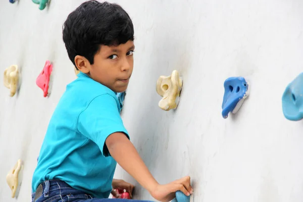 Latin Dark Haired Male Child Blue Shirt Practicing Sports Wall — Stock fotografie