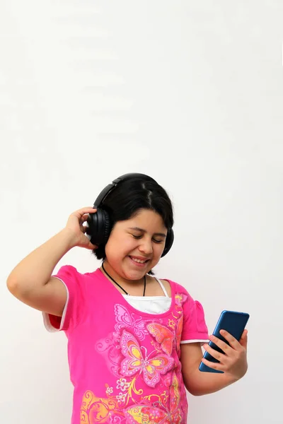 Year Old Hispanic Girl Listens Music Her Headphones Connected Her — Photo