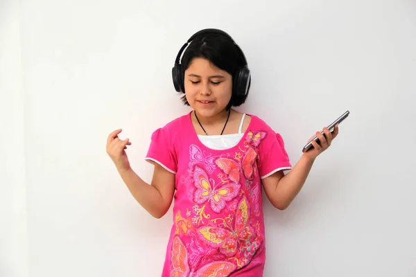 Year Old Hispanic Girl Listens Music Her Headphones Connected Her — Photo