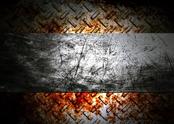 Metal plate over grunge rusted background — Stock Photo, Image