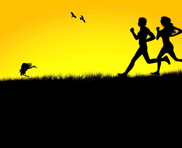 Silhouette d'un couple jogging pendant le coucher du soleil — Photo