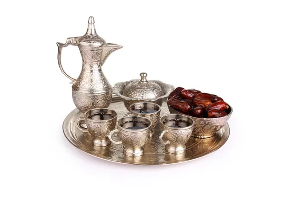 Antique silver pitcher and coffee cup set with dates in a tray i — Stock Photo, Image