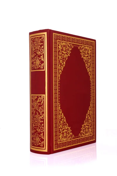 Old red book with gold color ornament on cover isolated on white — Stock Photo, Image