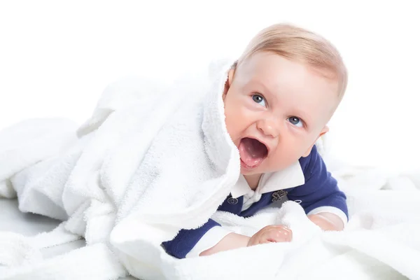 Baby is lying down on floor — Stock Photo, Image