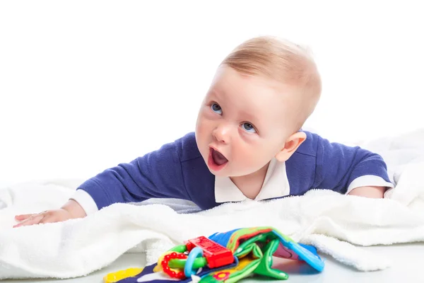 Baby is lying down on floor — Stock Photo, Image