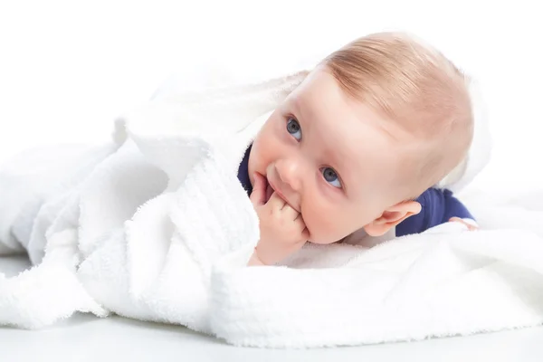 Baby is lying down on floor — Stock Photo, Image