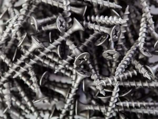 Black drywall screws — Stock Photo, Image