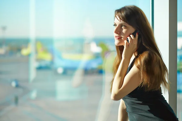 Mulher no aeroporto — Fotografia de Stock