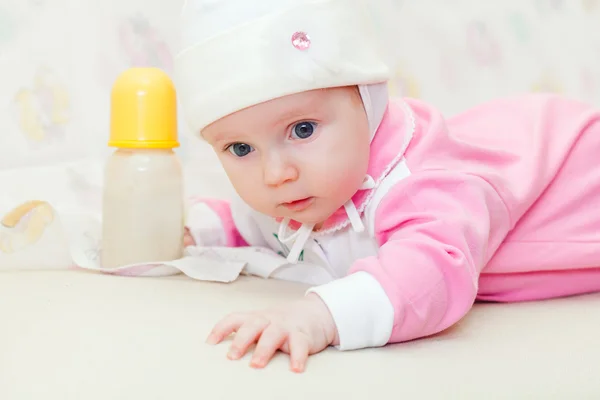 Little baby with bottle of milk — Stock Photo, Image