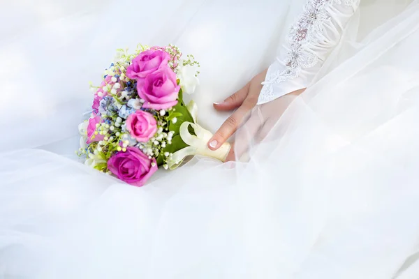 Bride with her flowers — Stock Photo, Image