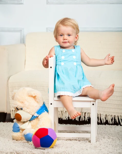 Little child is sitting on the chair — Stock Photo, Image