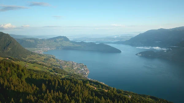 Beautiful summer view to Lucerne lake Vierwaldstattersee in the morning. Swiss Alps, Switzerland 