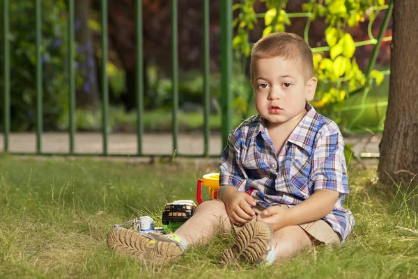 Child in park on grass — Stock Photo, Image