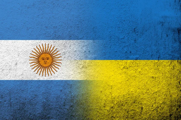 National flag of Argentina with National flag of Ukraine. Grunge background