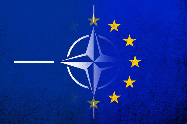 Flag of the European Union with Flag of North Atlantic Alliance NATO. Grunge background