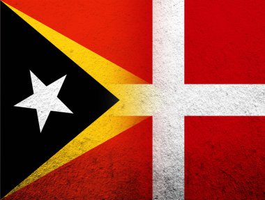 Timor-Leste Doğu Timor Ulusal Bayrağı taşıyan Danimarka Krallığı Ulusal Bayrağı. Grunge Arkaplanı