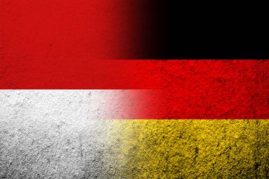 The national flag of Germany with The Republic of Indonesia National flag. Grunge background
