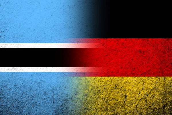 Національний Прапор Німеччини Національним Прапором Ботсвани Grunge Background — стокове фото