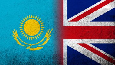 National flag of United Kingdom (Great Britain) Union Jack with The Republic of Kazakhstan National flag. Grunge background
