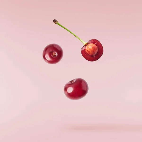 Fresh Raw Cheery Falling Air Pink Background Food Zero Gravity — Stock Photo, Image