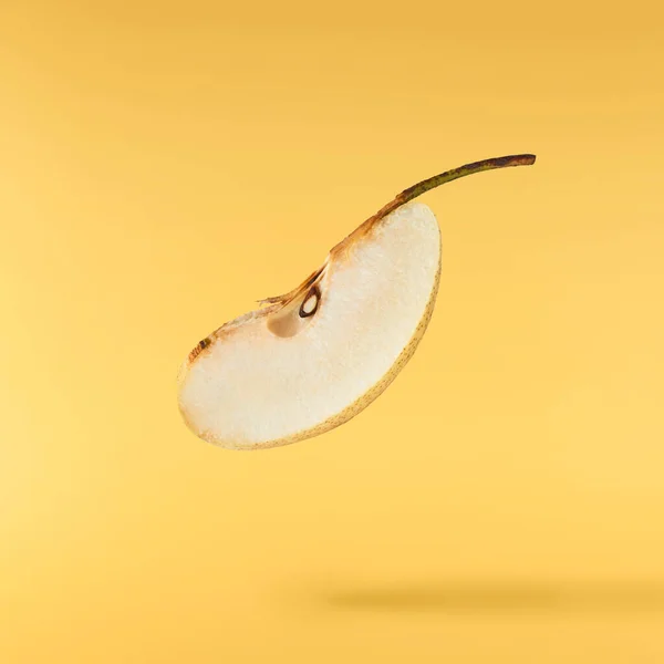 Fresh Yellow Ripe Raw Pear Falling Air Isolated Yellow Background — Photo