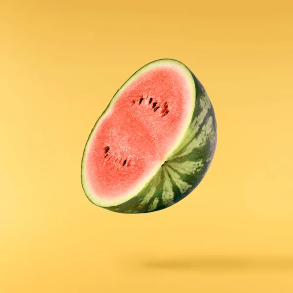 Fresh Raw Watermelon Falling Air Isolated Yellow Backgeound Food Levitation — Fotografia de Stock