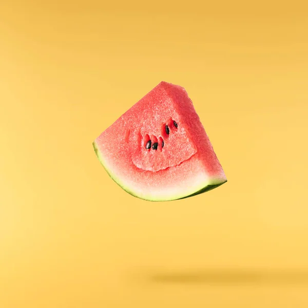 Fresh Raw Watermelon Falling Air Isolated Yellow Backgeound Food Levitation — Zdjęcie stockowe
