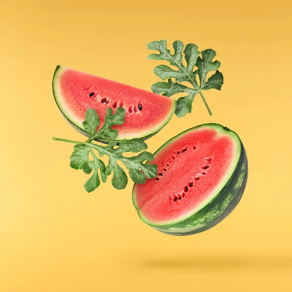 Fresh Raw Watermelon Falling Air Isolated Yellow Backgeound Food Levitation — Stockfoto