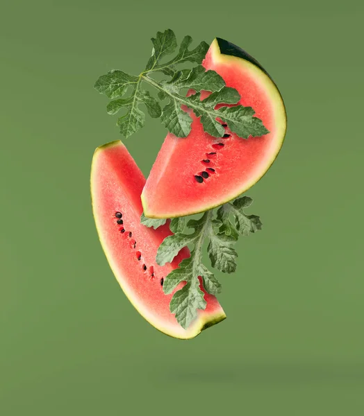 Fresh Raw Watermelon Falling Air Isolated Green Background Food Levitation — Stockfoto