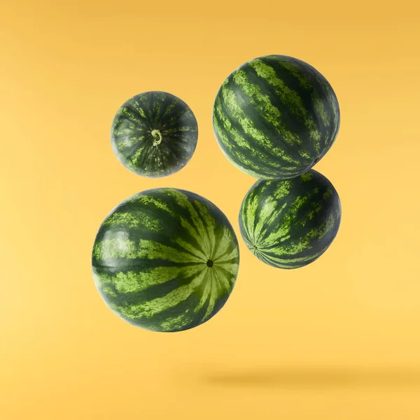 Fresh Raw Watermelon Falling Air Isolated Yellow Backgeound Food Levitation — 스톡 사진
