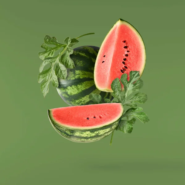 Fresh Raw Watermelon Falling Air Isolated Green Background Food Levitation — 스톡 사진