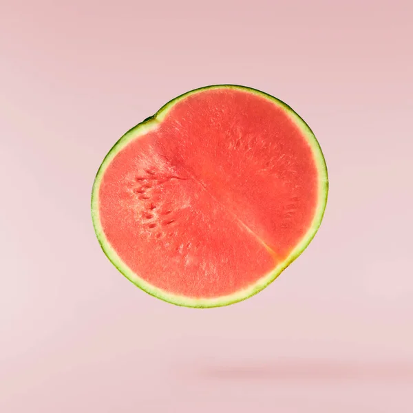 Fresh Raw Watermelon Falling Air Isolated Pink Background Food Levitation — Zdjęcie stockowe